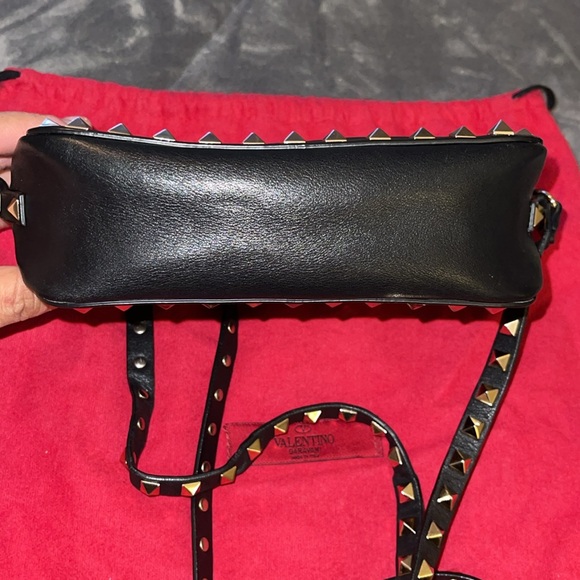 Preload Valentino, black n gold spike Crossbody excellent condition 7”X 5”. - Picture 10 of 12